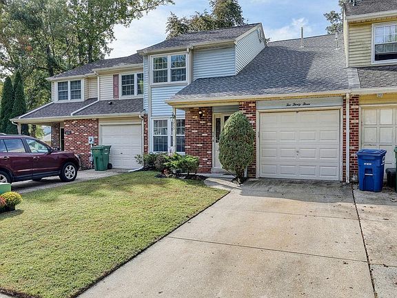 Private driveway and covered entry.