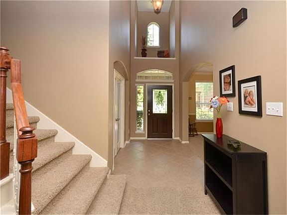 Two-story foyer makes the statement that this home is open and spacious.