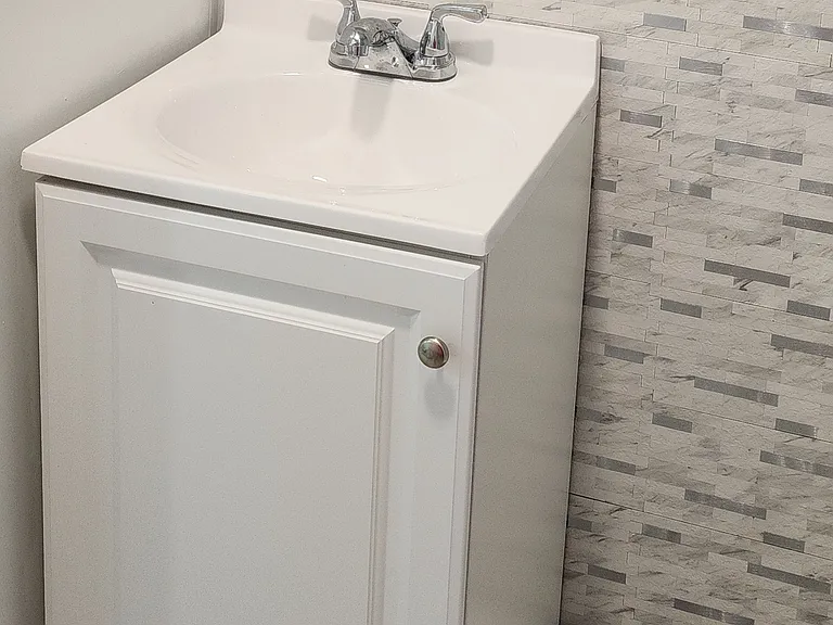 Vanity with medicine cabinet above