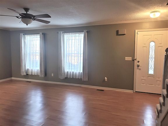 Spacious living room with laminate flooring