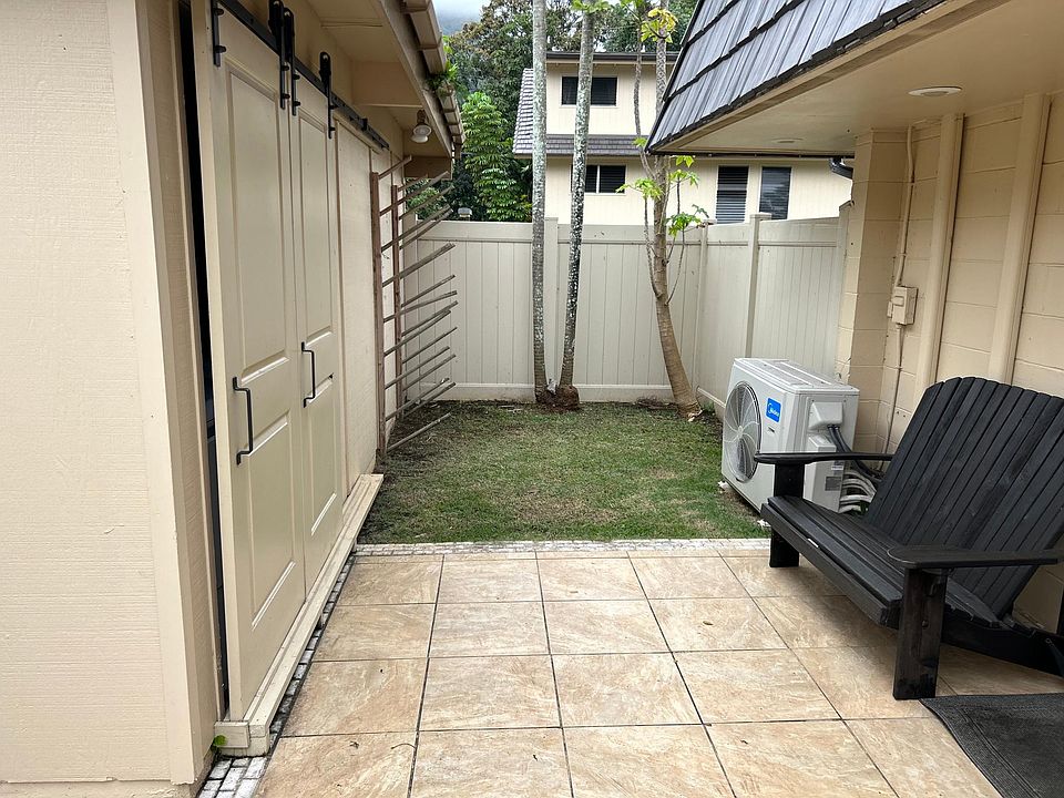 Gated Front Patio, surf rack, and Lawn (professional yard service 1x a month included in rent)