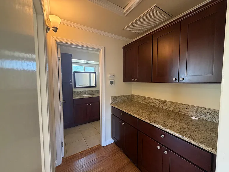 115 E 3rd St — Photo 11