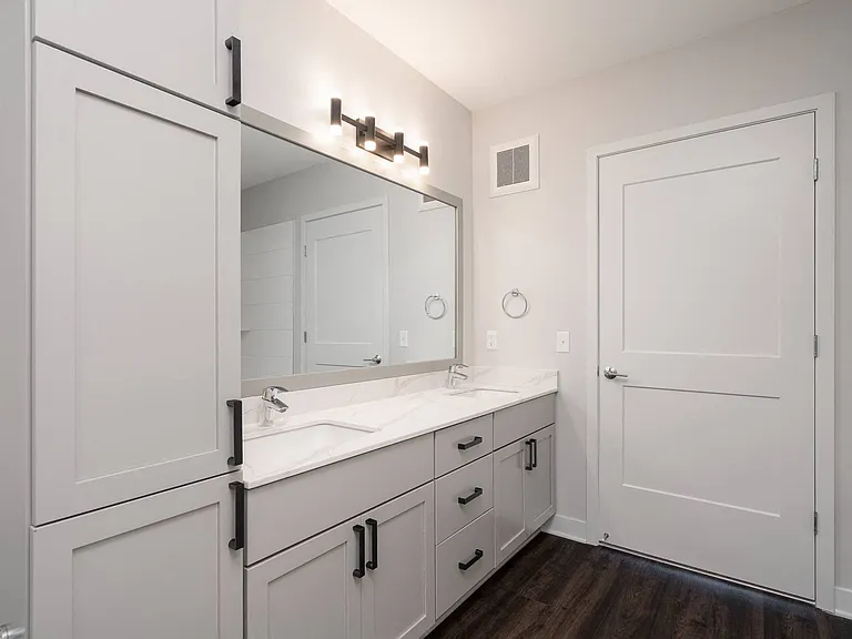 Some homes feature a dual sink vanity in the primary bath.
