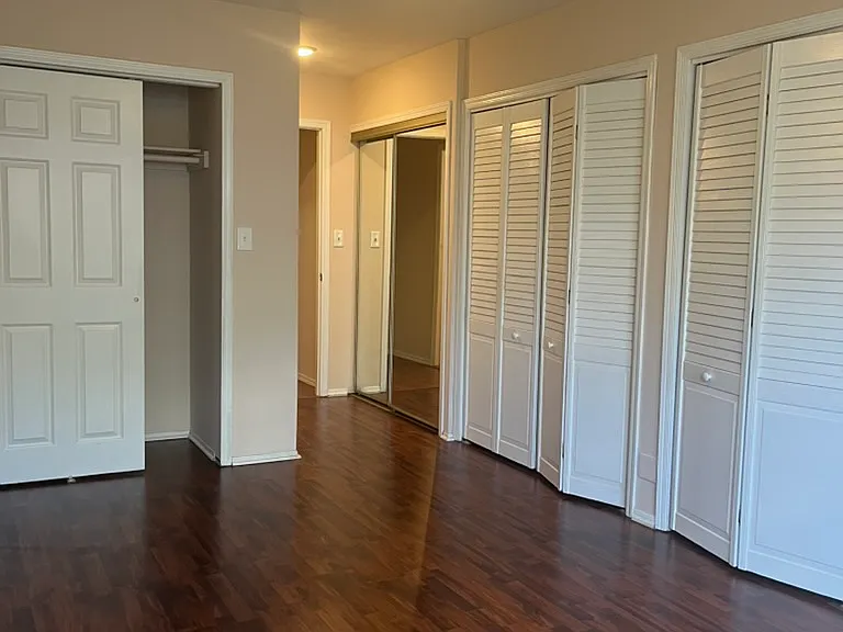 The oversized primary suite features an exceptional wall of closets_offering storage rarely found in comparable Concordia rentals_plus an updated en-suite bathroom.