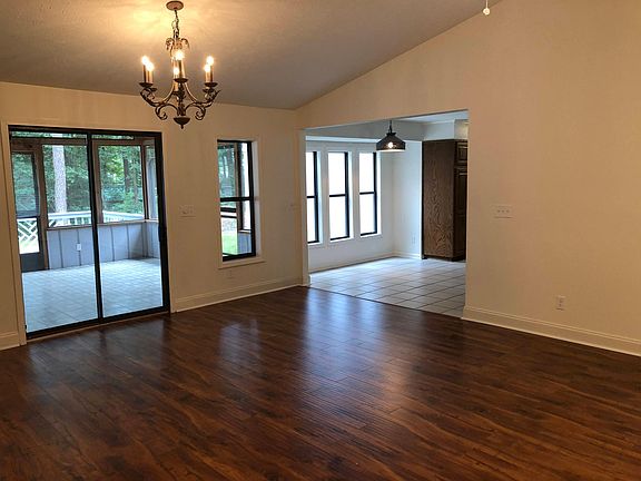 Dining area in great room looking into breakfast nook