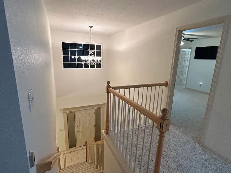 Stair way look down to front door