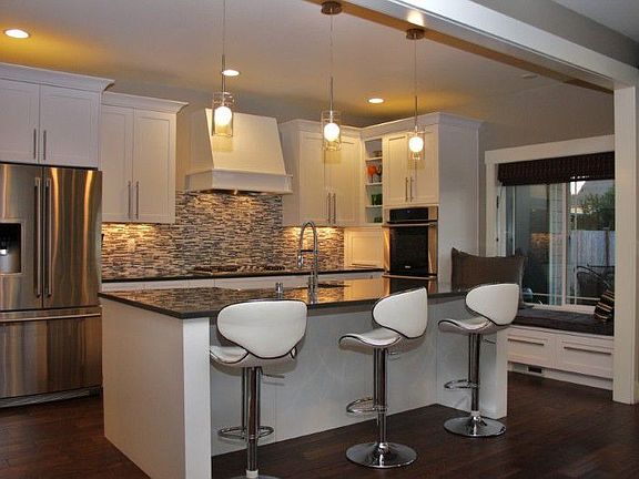 High-end custom kitchen with tons of upgrades. Electrolux appliances, double oven, Caesar Stone soli