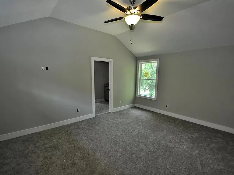Master bedroom with ensuite bathroom and walk in closet