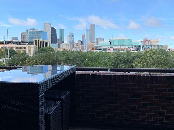 Large balcony with bar-height dining set. Perfect for morning coffee or evening nightcap!