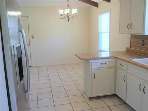 View from Kitchen to Eat In Dining Area