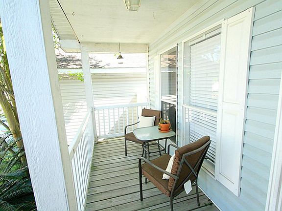 LOVELY FRONT COVERED PORCH!