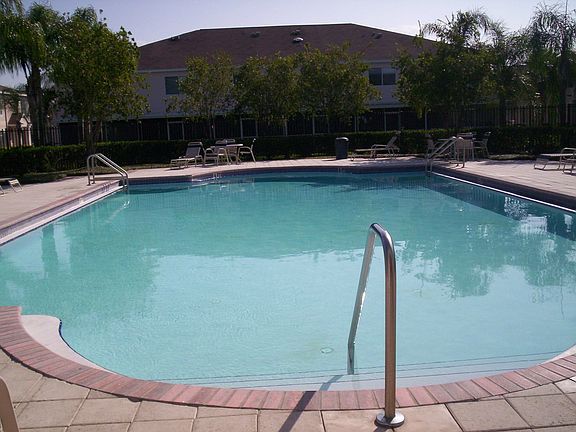 Pool directly behind screened room