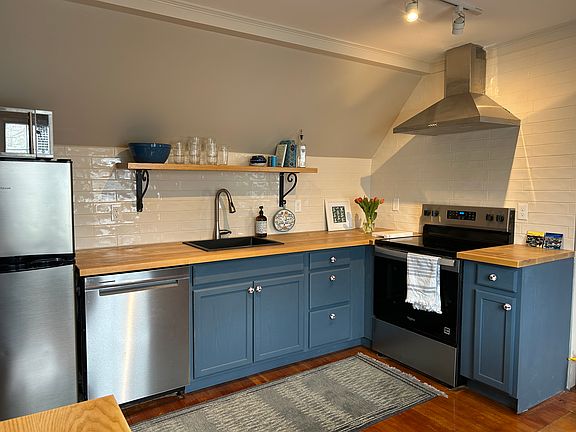 updated kitchen with new stainless steel appliances