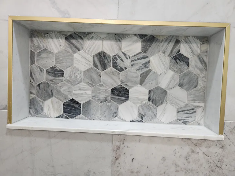 Even with multiple people sharing a bathroom, this shower niche should have no problem holding it all!