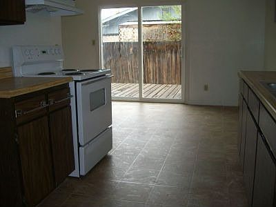 looking at kitchen to the WEst-sliding d