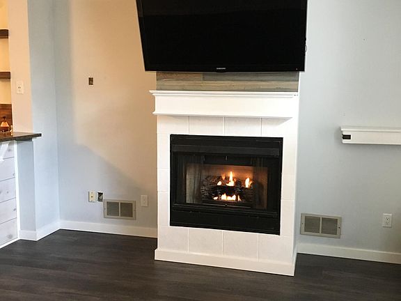 Living Room (Gas Fireplace, New Flooring & Trim)