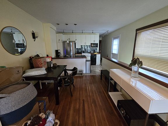 Open layout living, dining and kitchen space.
