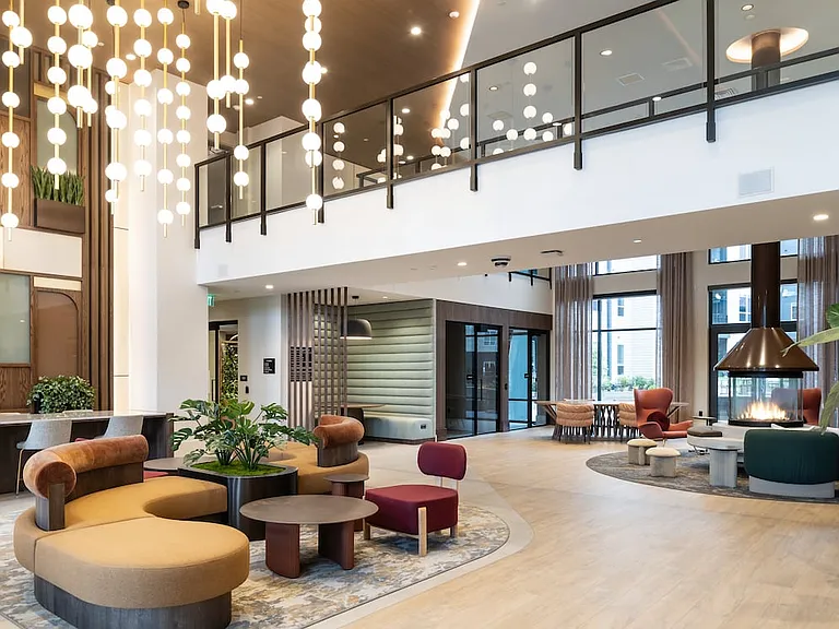 New West Phase - Two story lobby lounge and co-work space