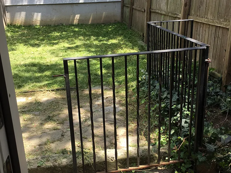This is older picture of yard. Currently needs seeding & some care!