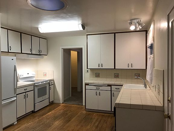 Kitchen with Electric Range/Oven & Refrigerator