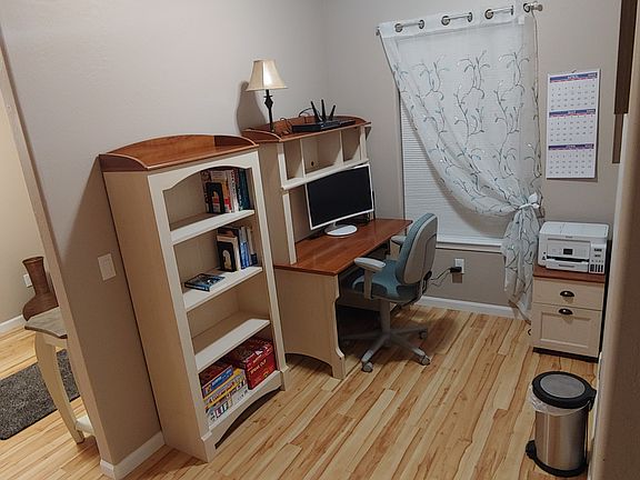 Office nook near front entry. 27" Samsung curved monitor, Epson printer.
