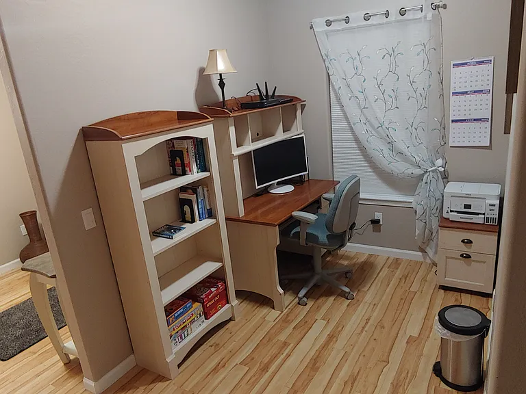 Office nook near front entry. 27" Samsung curved monitor, Epson printer.