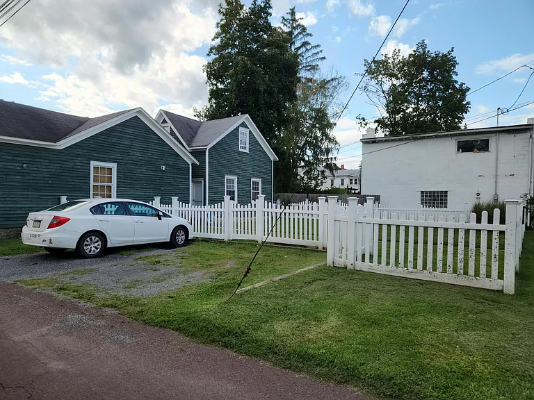 Off-street parking spot in rear