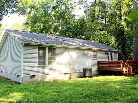 Back of home with decking