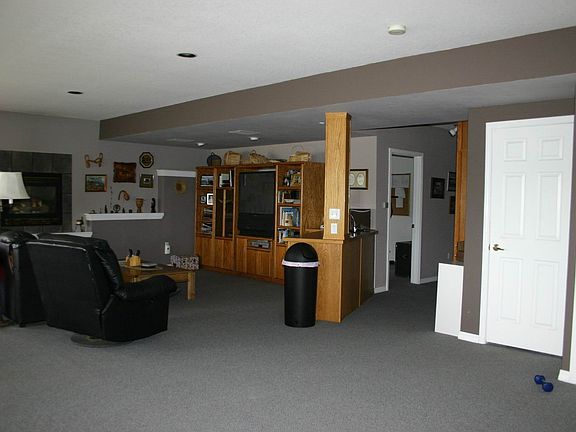 Family room with wet bar, access to the hot tub and patio area.