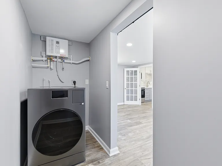 Laundry room | New laundry unit. New Tankless water heater