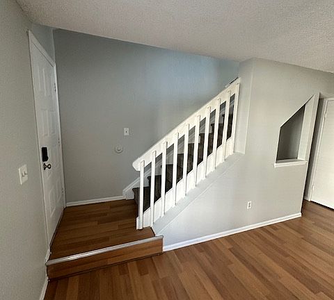 Entryway with laminate flooring.