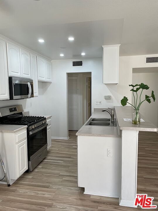 1st image of 18640 Collins St APT 107