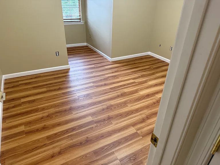 Second bedroom with new flooring and lots of storage