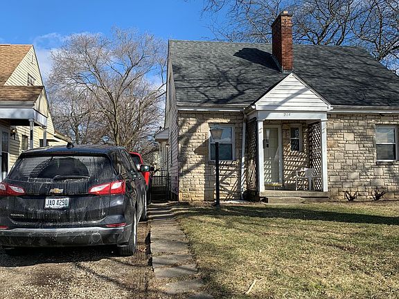 House overview. Two vehicles can easily park in driveway.