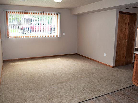 Storage under steps by living area