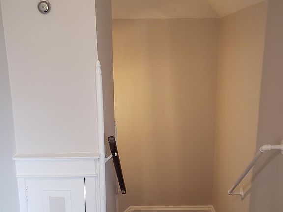 back staircase from common laundry area and great option for winter