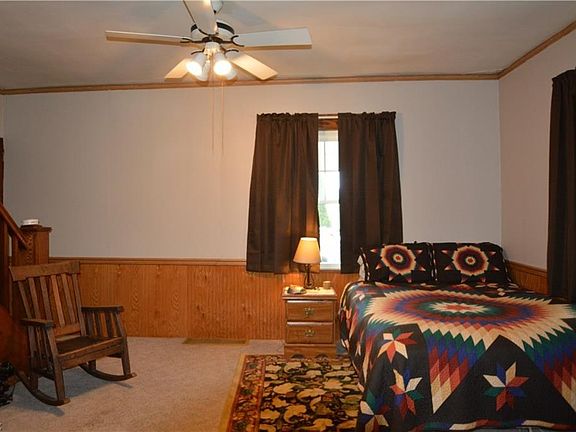 Living Rm space being used as a Bedroom.