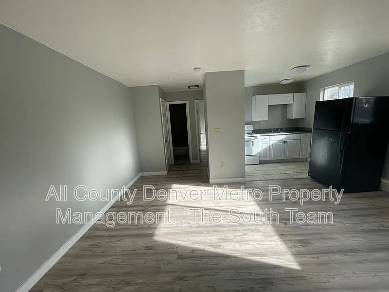 Building Photo - 9597 E 19th Ave #6