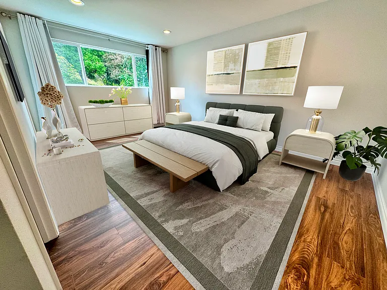 Master bedroom with a walk-in closet