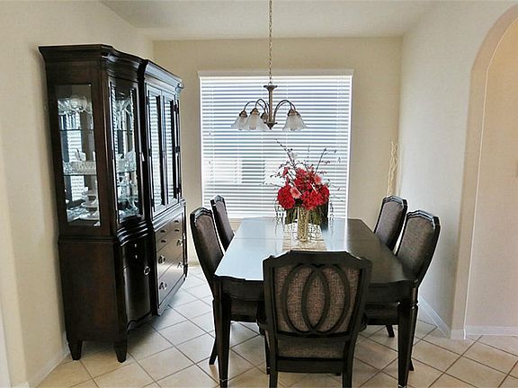 The formal dining room is to the left of the entry foyer.