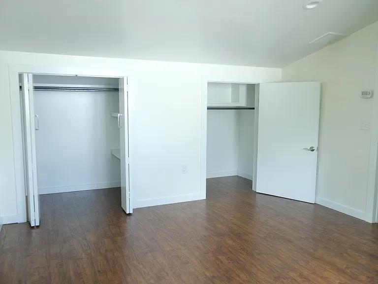Oversize, double deep closets in the primary with extra storage shelves.