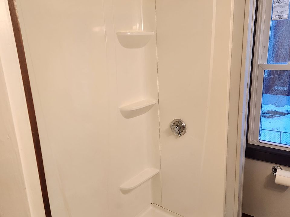 Large step in shower unit.