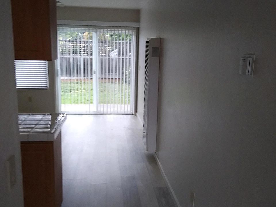 Indoor/Outdoor living space with patio and shared backyard space!