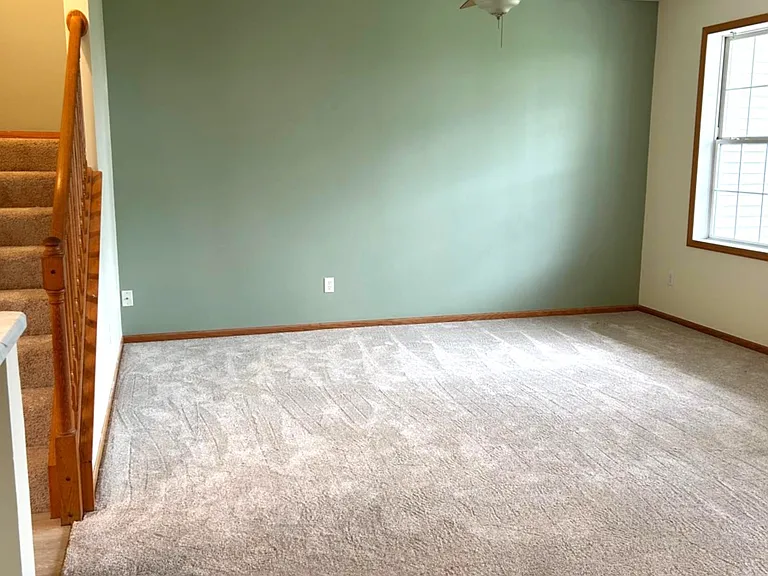 15' wide x 20' length freshly painted Family room without furniture