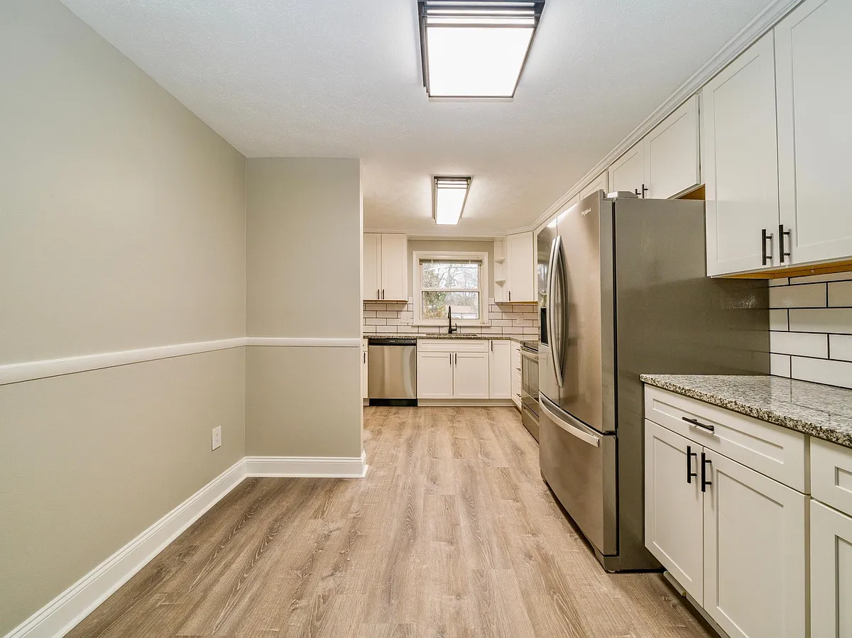 Spacious Kitchen where you can add a dinette table and chairs - 1908 Penfield Rd