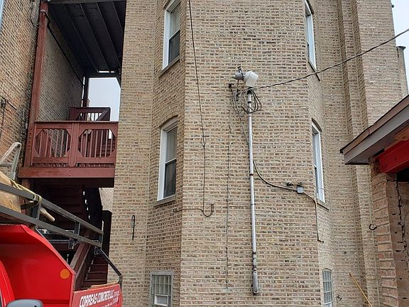 Unit has a side porch