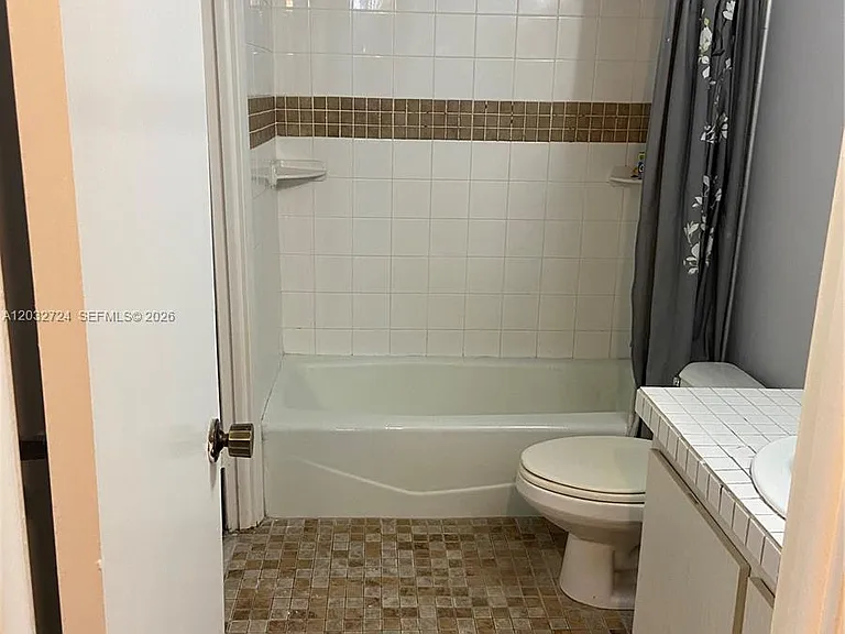 1470 NE 123rd St #A104 — Photo 9