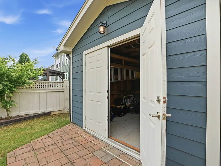 Shed for storing golf cart