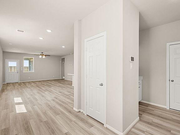 The welcoming entryway leads to the open concept living space.