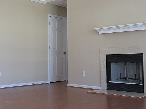 Fireplace and Ceiling fan with Vaulted Ceilings